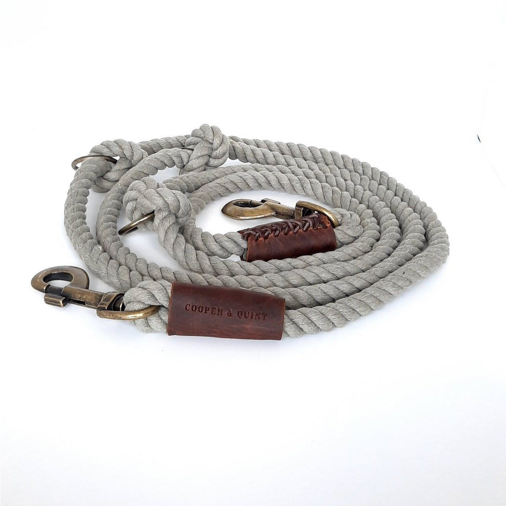 Olive green twisted organic cotton dog leash with antique brass hardware and adjustable rings.