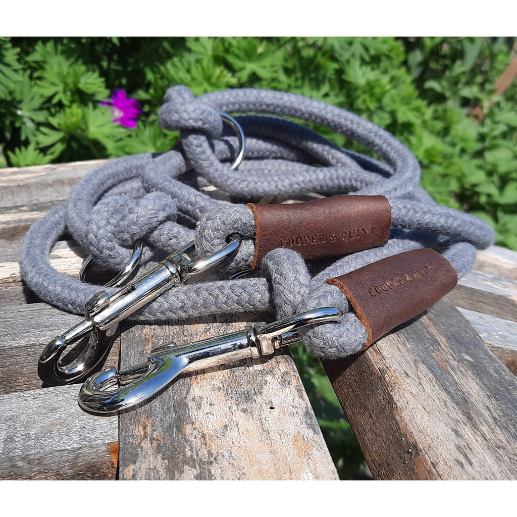 Detail of silver snap hook and soft-touch gray organic cotton rope.