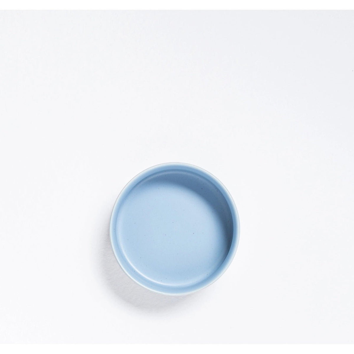 Top view of a Sky Blue Cloud stoneware bowl showing the smooth glazed interior