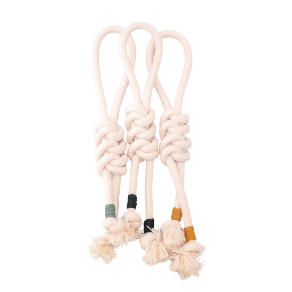 Eco-friendly handmade dog rope toys in three modern sustainable colors.