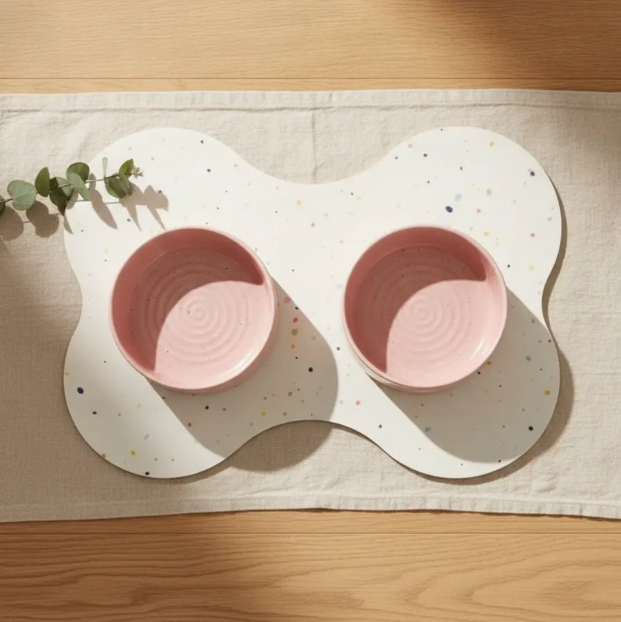 Satin Pink Cloud 16.5 cm bowls on a bone-shaped placemat