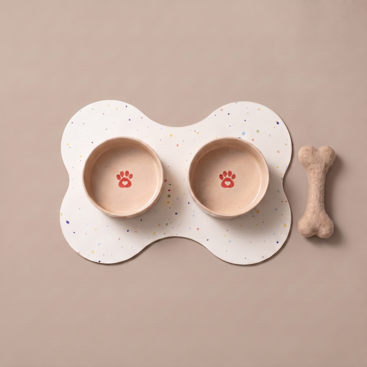 Smiley Bark large dog set — Cozy Hearts bowls, placemat and wool bone, studio shot