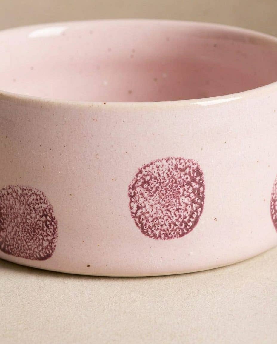 Close-up of a rose dot on a hand-glazed Pink Polka Dot bowl