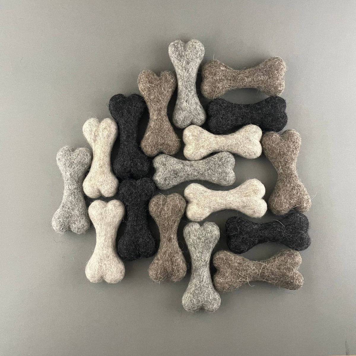 Petite felted wool bones in cream, grey, brown and charcoal
