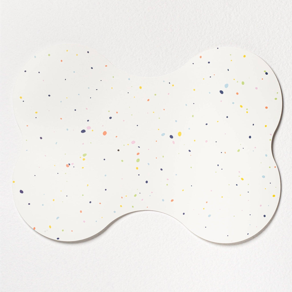 Bovenaanzicht van de witte Splatter Bone placemat